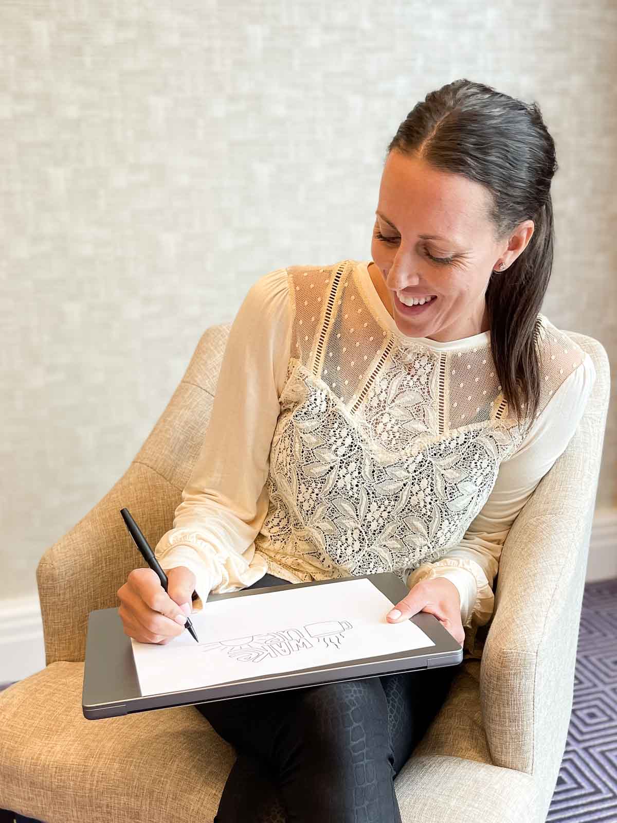 Jamie Shank, artist, drawing a free coloring page for kids.